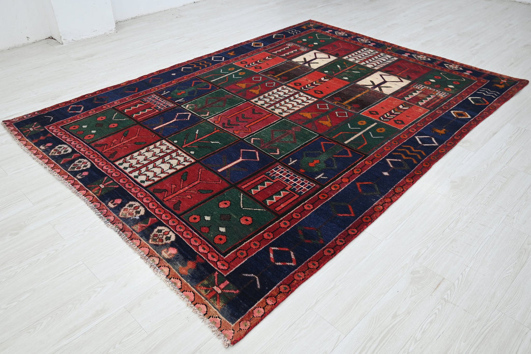 red Medium rug 6' 5" x 9' 1"