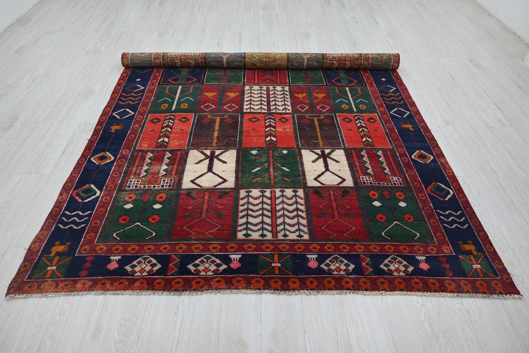red Medium rug 6' 5" x 9' 1"