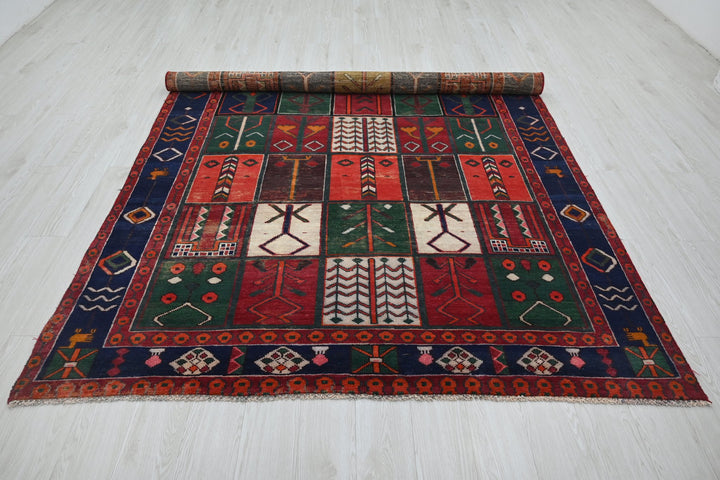 red Medium rug 6' 5" x 9' 1"