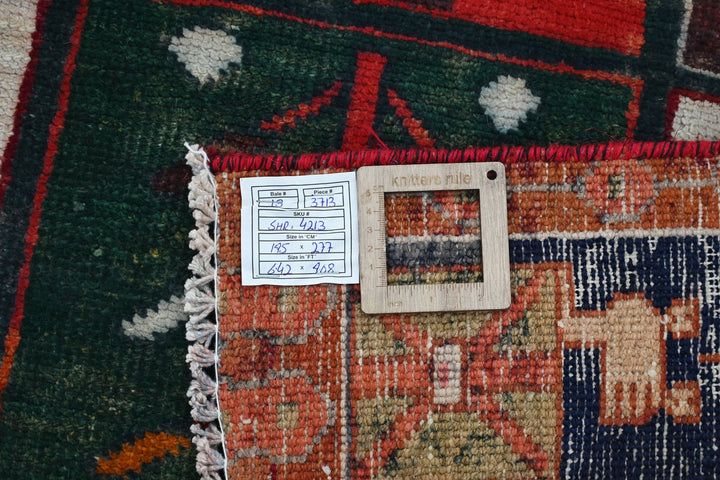 red Medium rug 6' 5" x 9' 1"