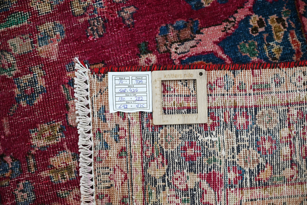 red Medium rug 5' 11" x 9' 3"