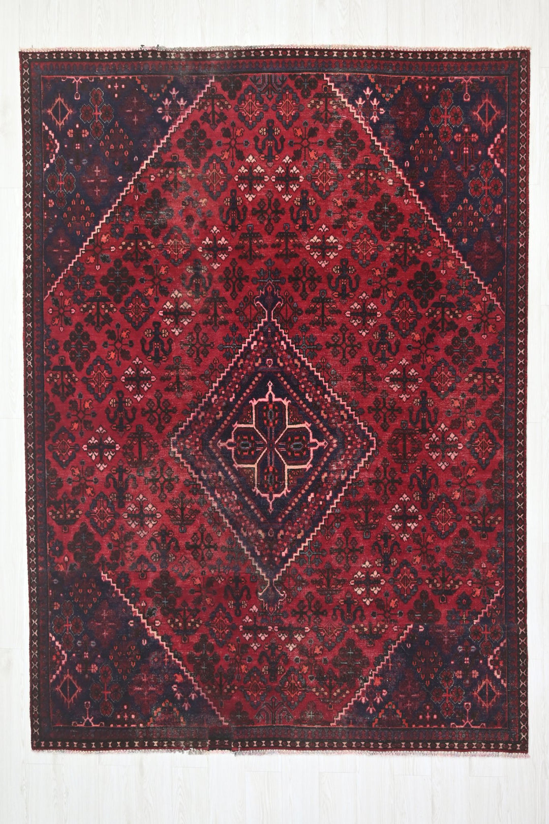 red Large rug 6' 9" x 9' 0"