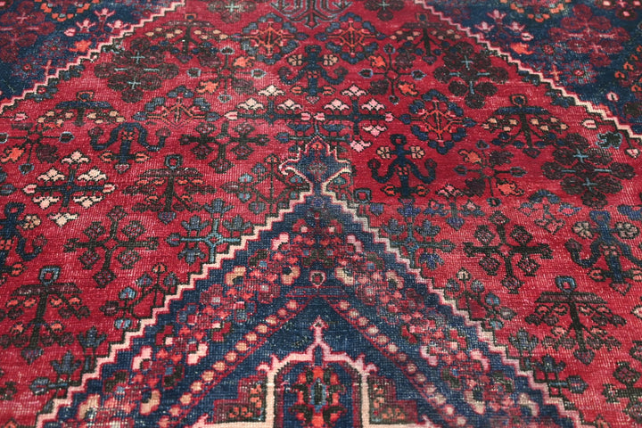 red Large rug 6' 9" x 9' 0"