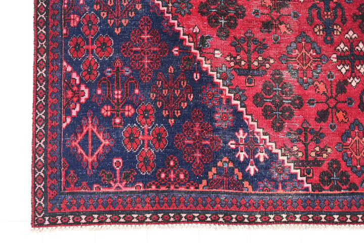 red Large rug 6' 9" x 9' 0"