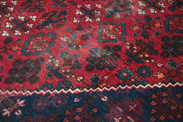 red Large rug 6' 9" x 9' 0"