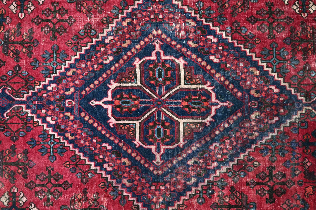 red Large rug 6' 9" x 9' 0"