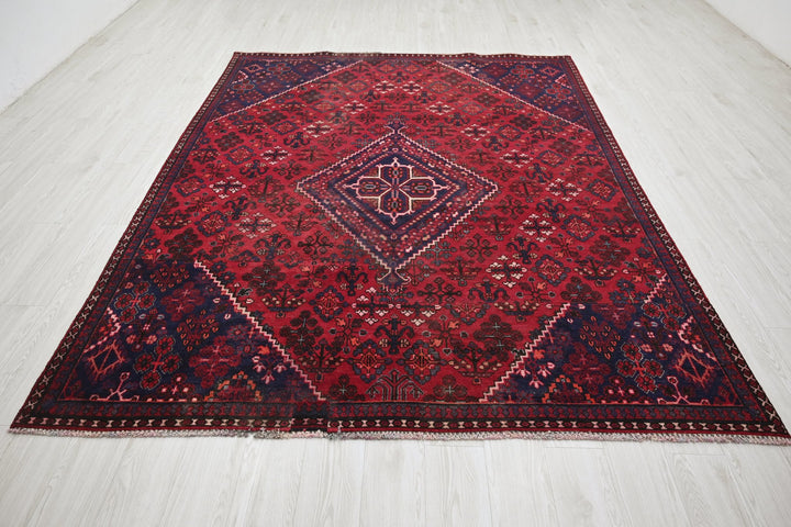 red Large rug 6' 9" x 9' 0"