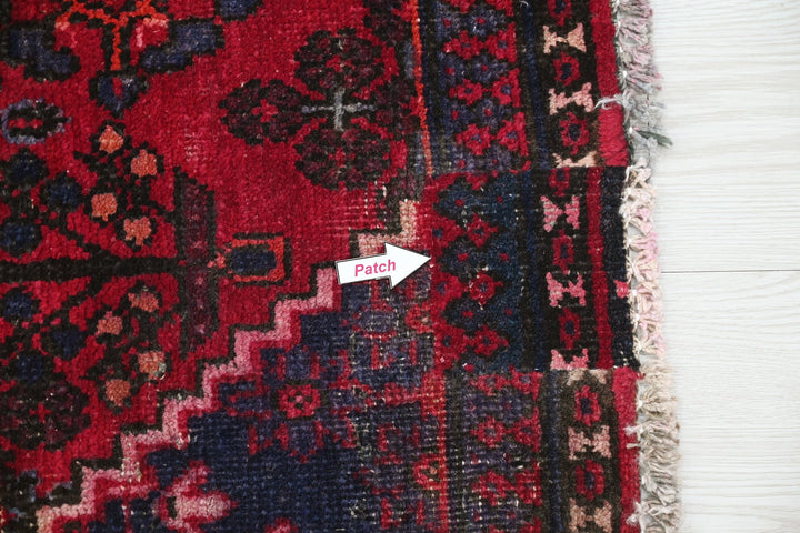 red Large rug 6' 9" x 9' 0"