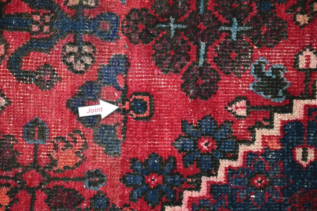 red Large rug 6' 9" x 9' 0"