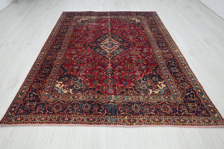 red Medium rug 6' 3" x 9' 0"
