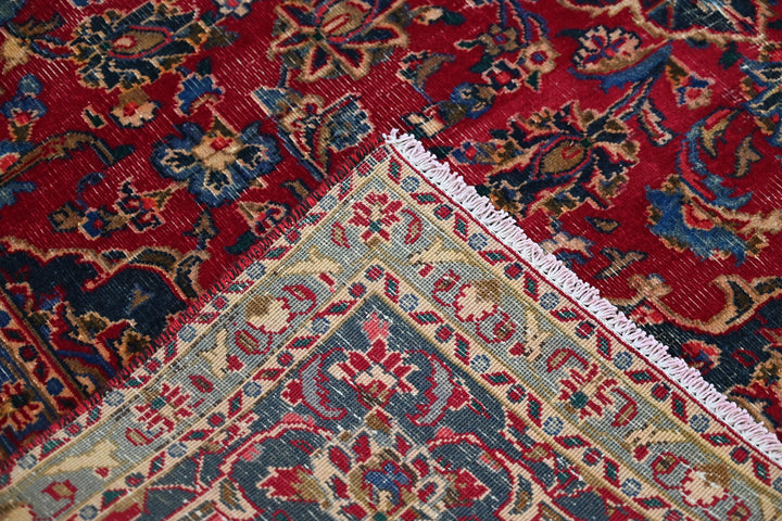 red Medium rug 6' 3" x 9' 0"