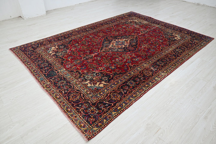 red Medium rug 6' 3" x 9' 0"
