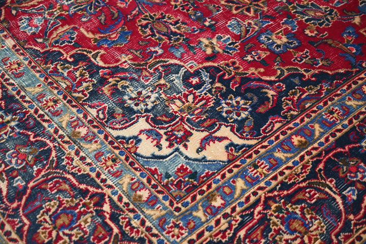 red Medium rug 6' 3" x 9' 0"