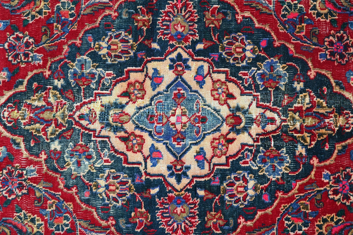 red Medium rug 6' 3" x 9' 0"