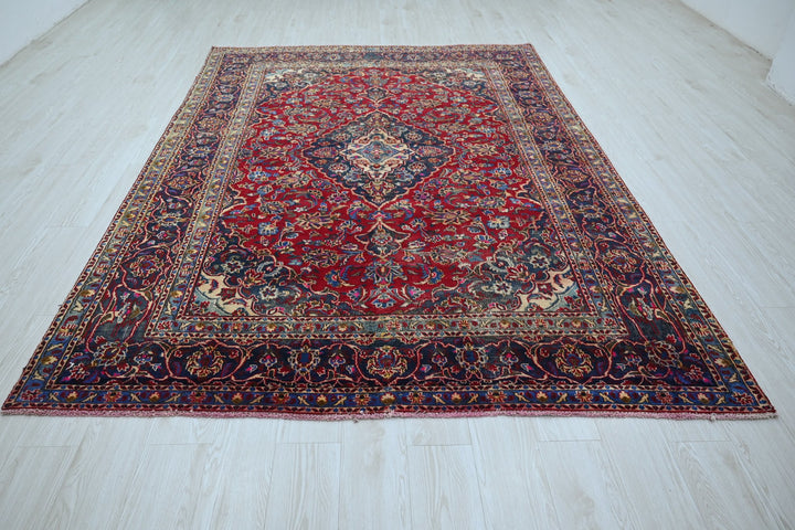 red Medium rug 6' 3" x 9' 0"