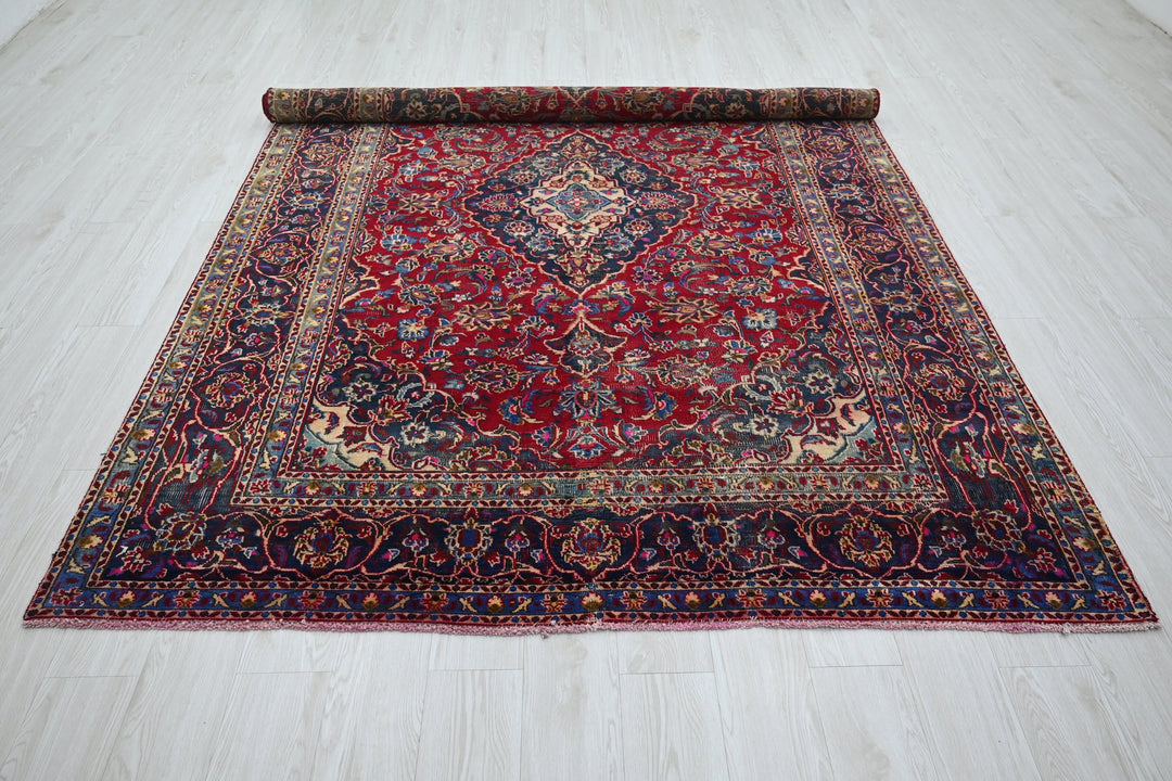 red Medium rug 6' 3" x 9' 0"