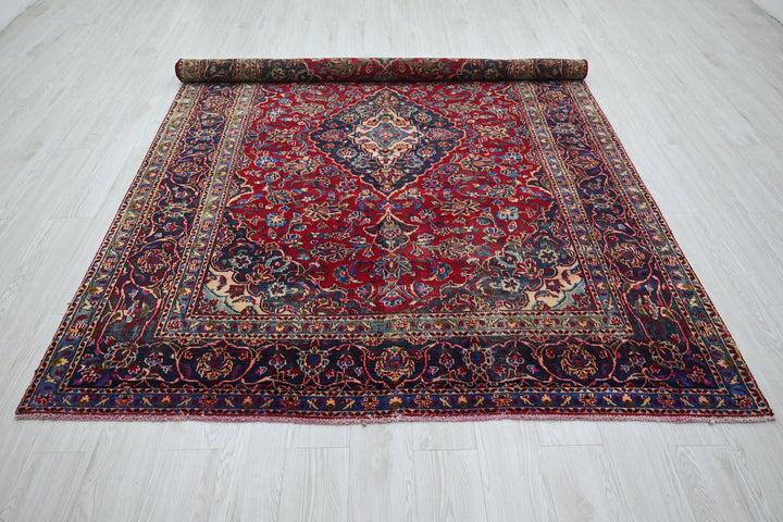 red Medium rug 6' 3" x 9' 0"