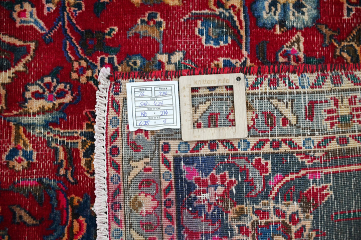 red Medium rug 6' 3" x 9' 0"