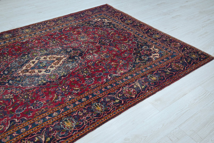red Medium rug 5' 8" x 8' 10"