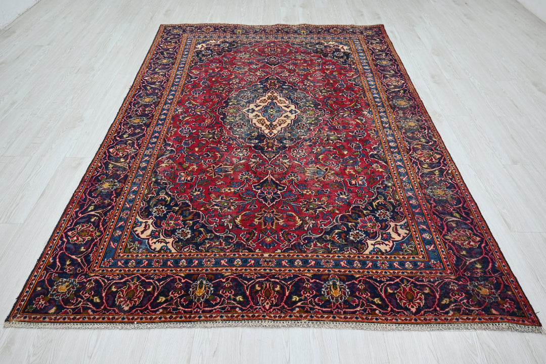 red Medium rug 5' 8" x 8' 10"