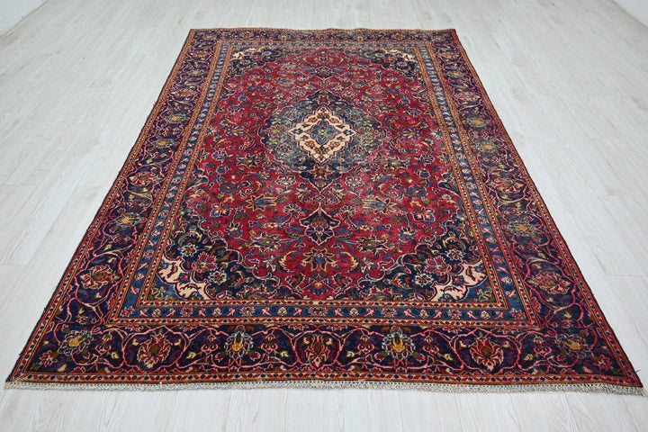 red Medium rug 5' 8" x 8' 10"