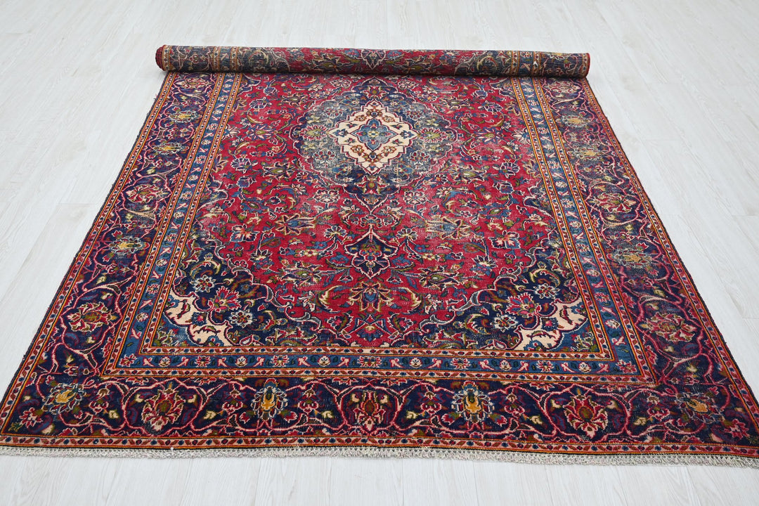 red Medium rug 5' 8" x 8' 10"