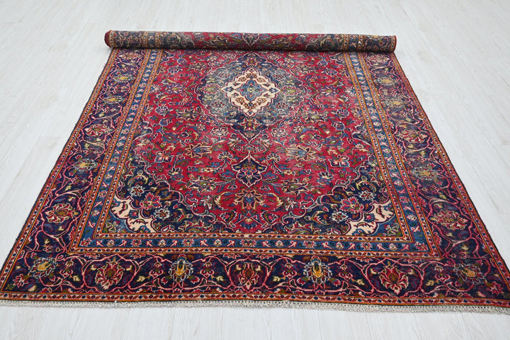 red Medium rug 5' 8" x 8' 10"