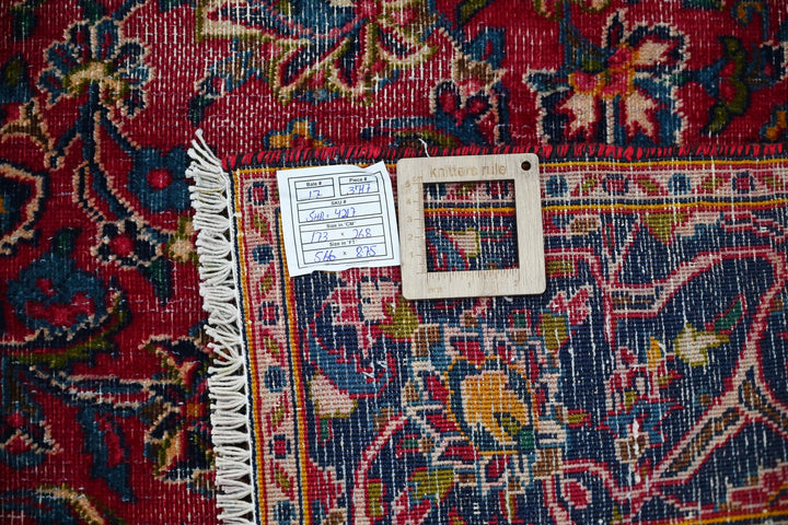 red Medium rug 5' 8" x 8' 10"