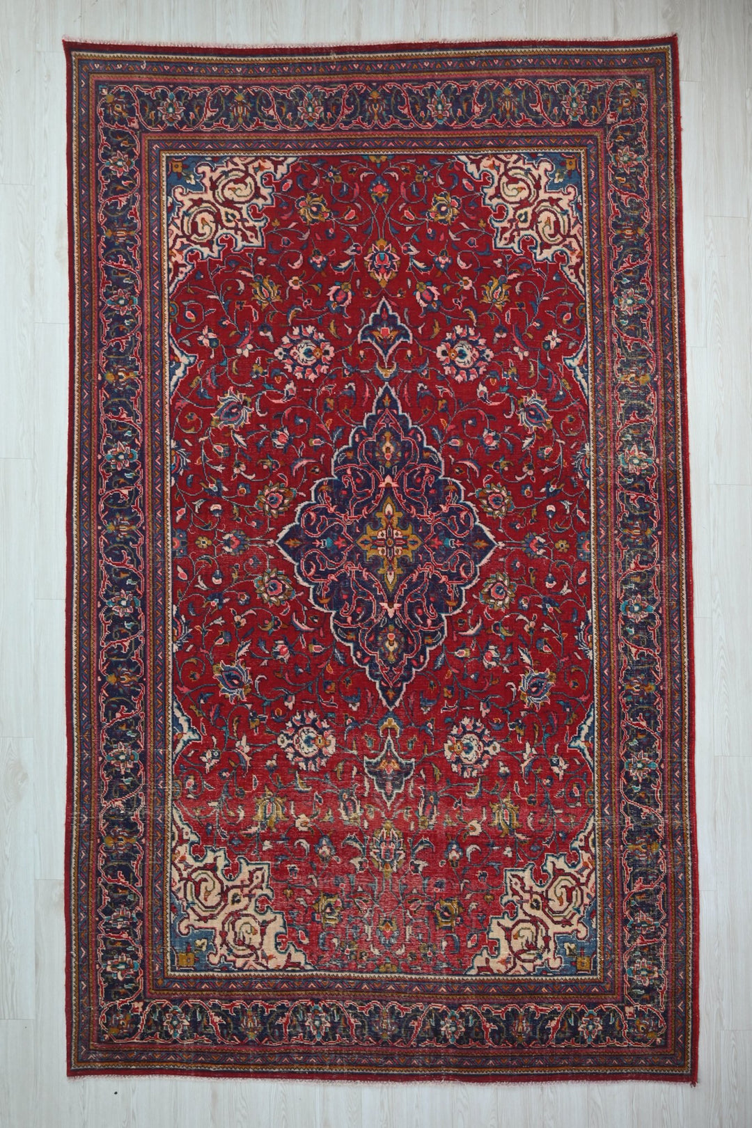 red Large rug 7' 0" x 11' 3"