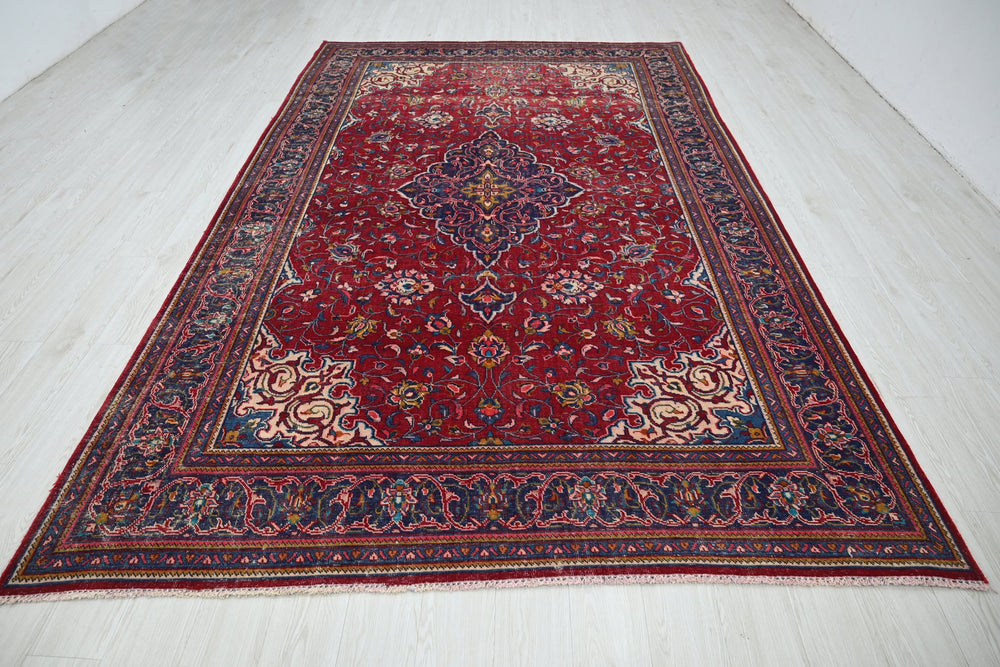 red Large rug 7' 0" x 11' 3"