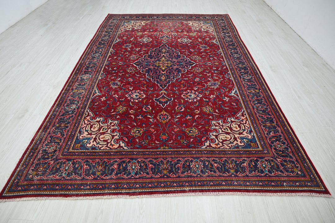 red Large rug 7' 0" x 11' 3"