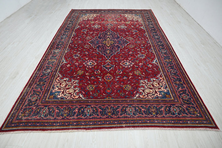 red Large rug 7' 0" x 11' 3"