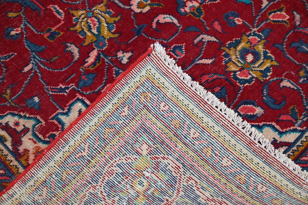 red Large rug 7' 0" x 11' 3"