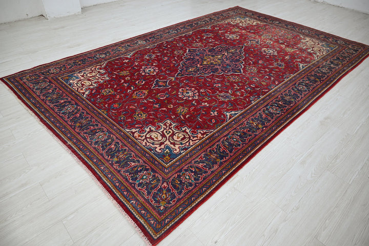 red Large rug 7' 0" x 11' 3"