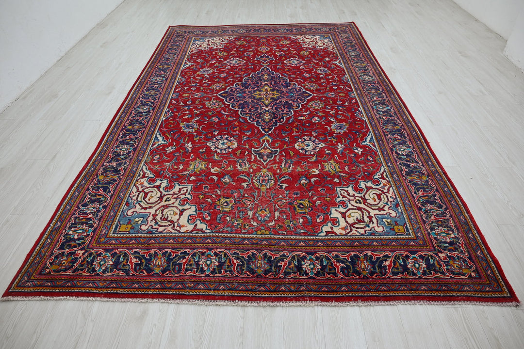 red Large rug 7' 0" x 11' 3"