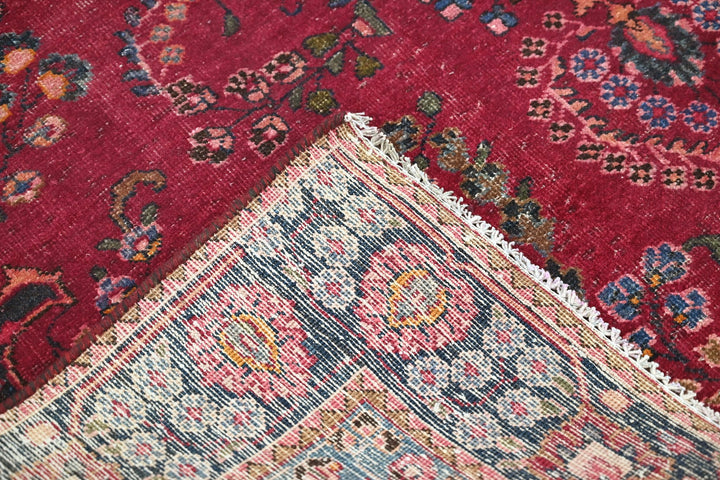 red Medium rug 5' 9" x 8' 10"