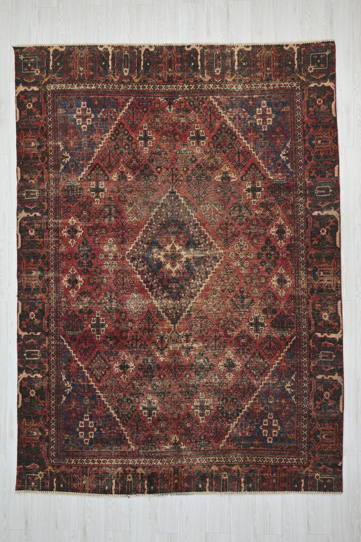 red Medium rug 6' 6" x 9' 0"