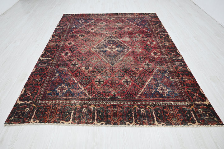 red Medium rug 6' 6" x 9' 0"