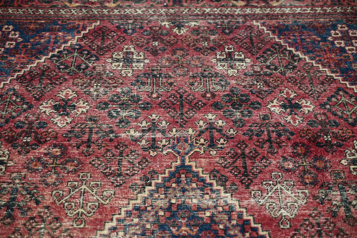 red Medium rug 6' 6" x 9' 0"