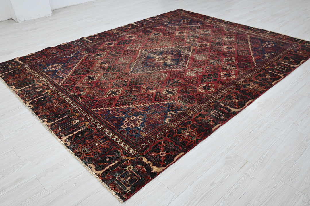 red Medium rug 6' 6" x 9' 0"
