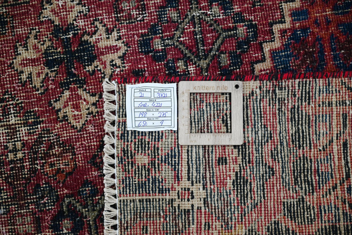 red Medium rug 6' 6" x 9' 0"