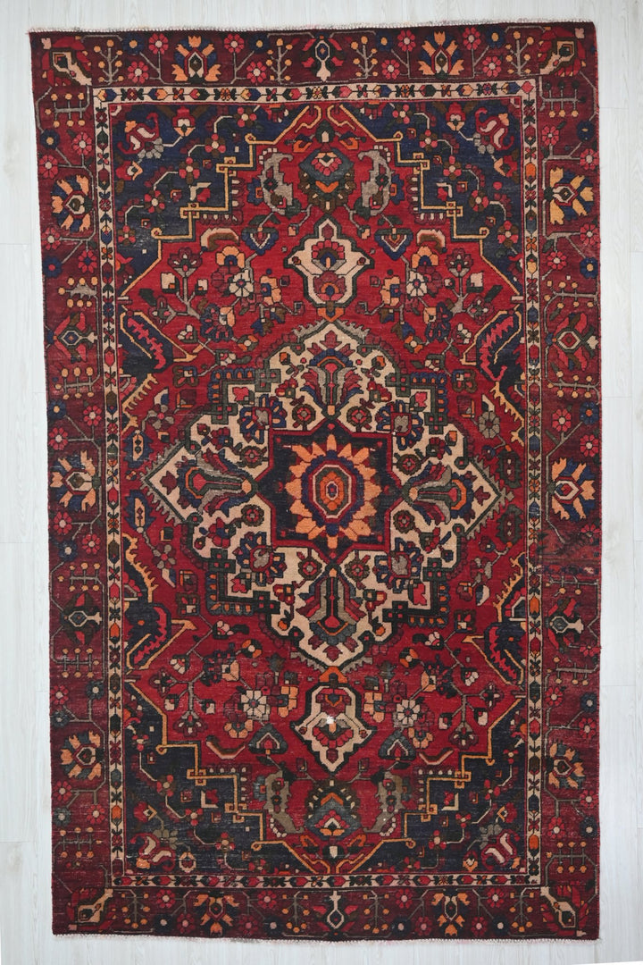 red Medium rug 6' 0" x 9' 3"