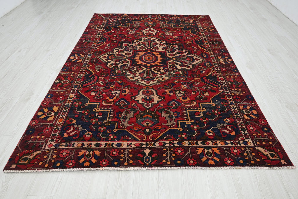 red Medium rug 6' 0" x 9' 3"