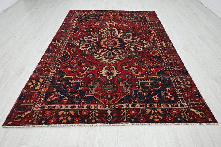 red Medium rug 6' 0" x 9' 3"