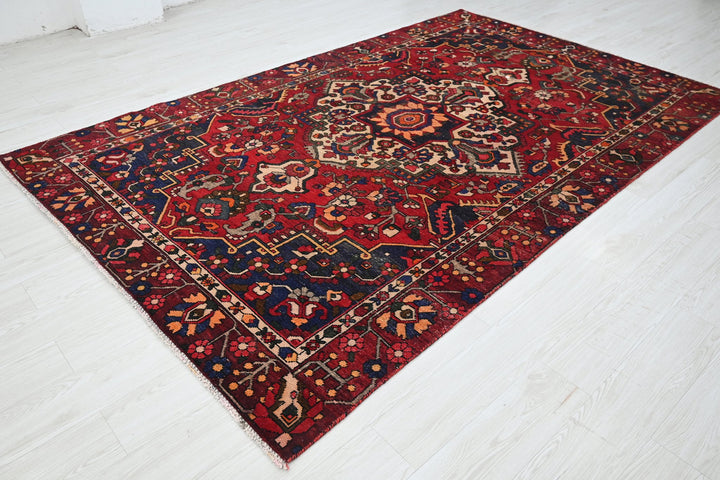 red Medium rug 6' 0" x 9' 3"