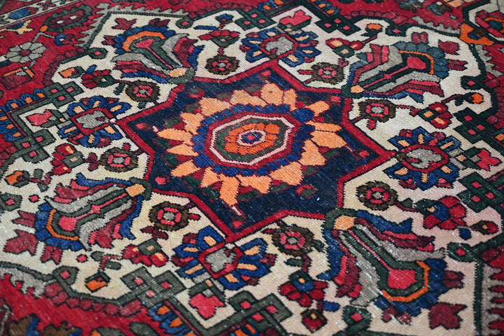 red Medium rug 6' 0" x 9' 3"