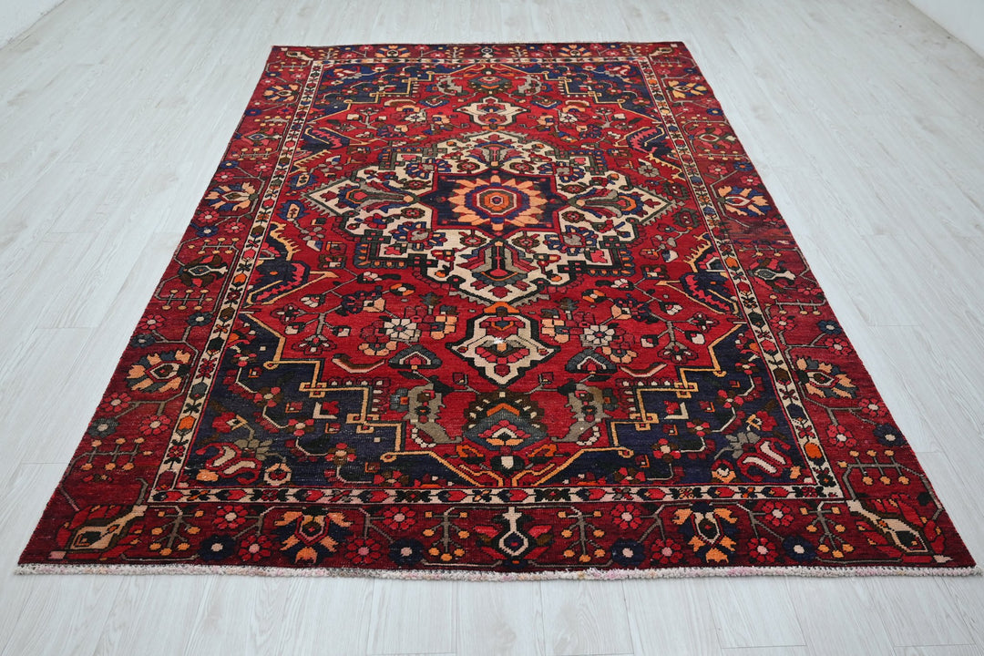 red Medium rug 6' 0" x 9' 3"