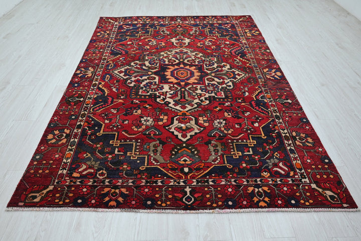 red Medium rug 6' 0" x 9' 3"