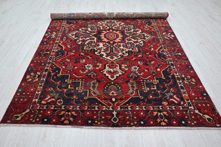 red Medium rug 6' 0" x 9' 3"