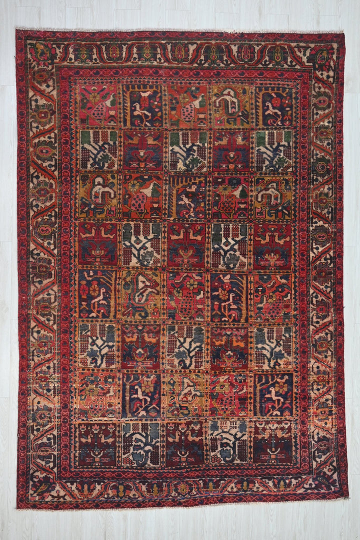 red Large rug 6' 7" x 9' 3"